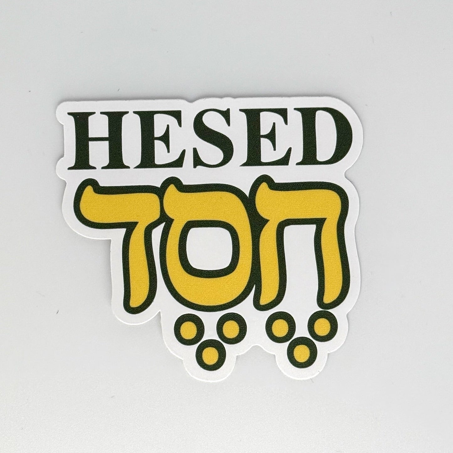 Waterproof sticker with the Hebrew word Hesed in a clean, bold design