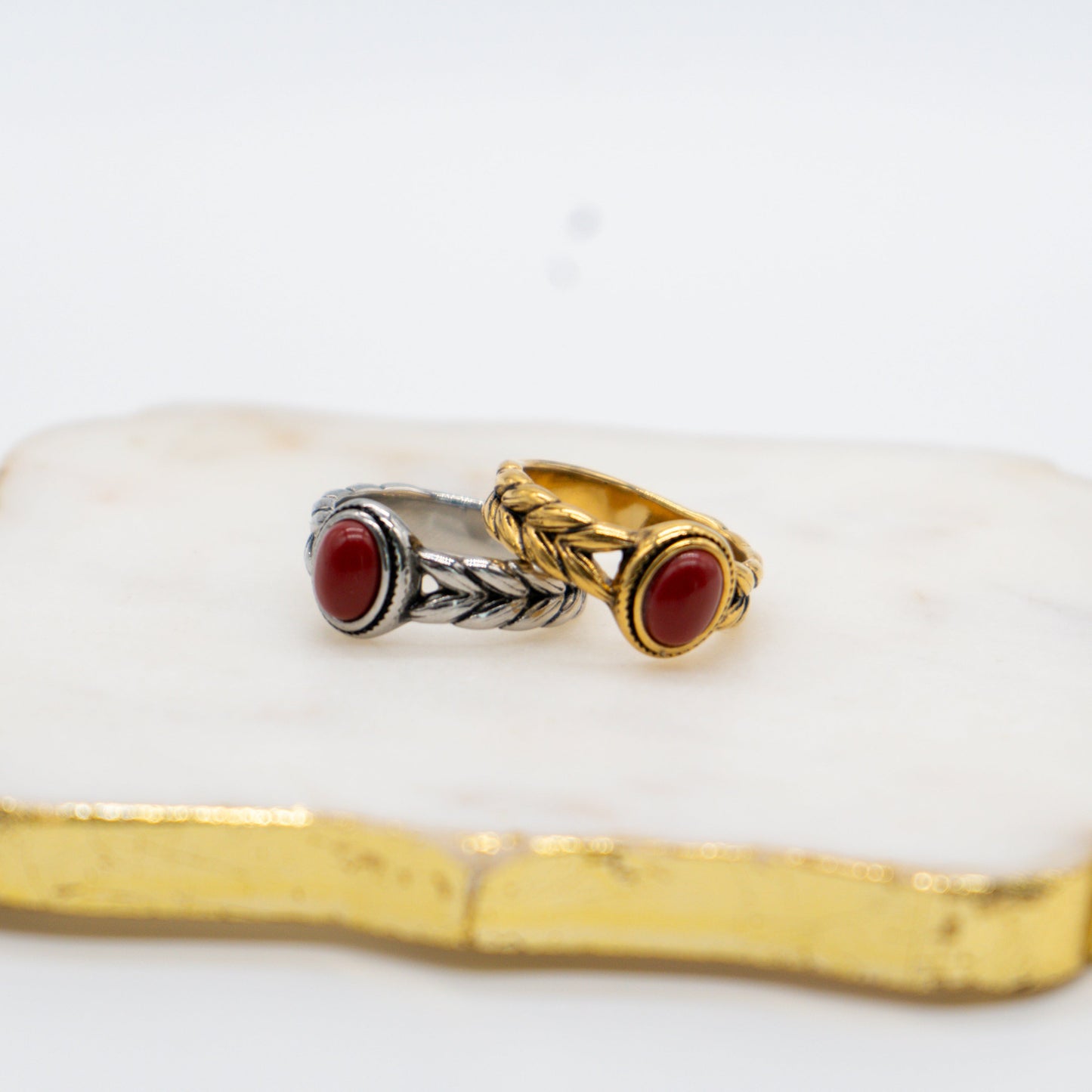 Elegant ring inspired by Ruth and the women of the Bible, featuring ruby-style stone and wheat design.
