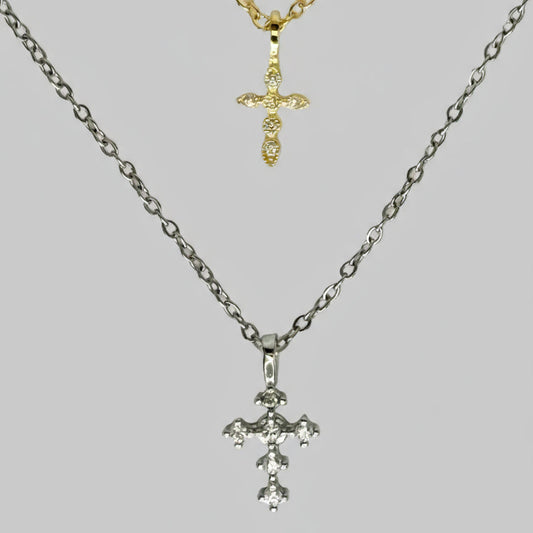 Dainty gold cross necklace symbolizing faith and devotion, available in non-tarnish silver or gold-plated finish.