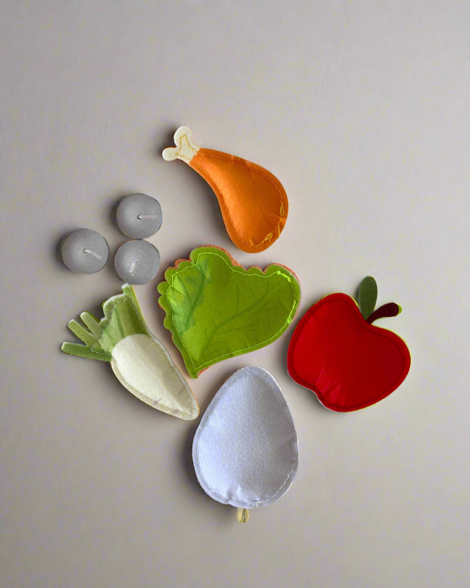 Felt food for play for the Seder plate for children to participate in a Seder with families. 
