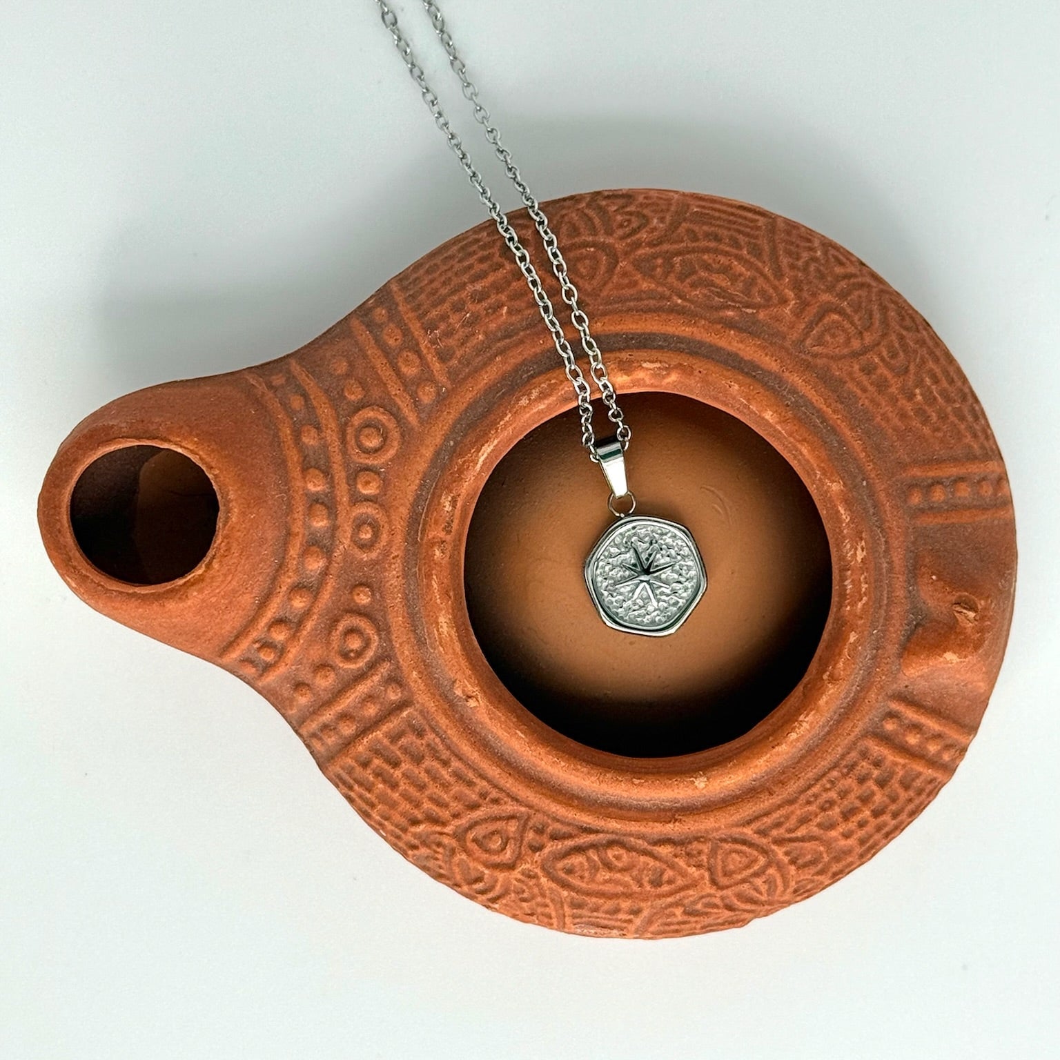 Minimalist star necklace representing faith, hope, and divine guidance through every season.