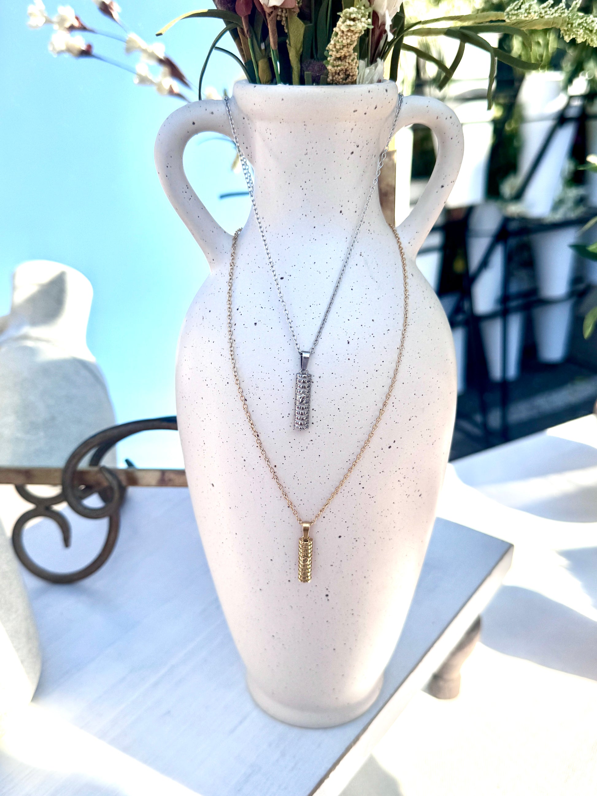 Mezuzah jewelry necklace in gold and silver with Shin, Western Wall Jewish design.
